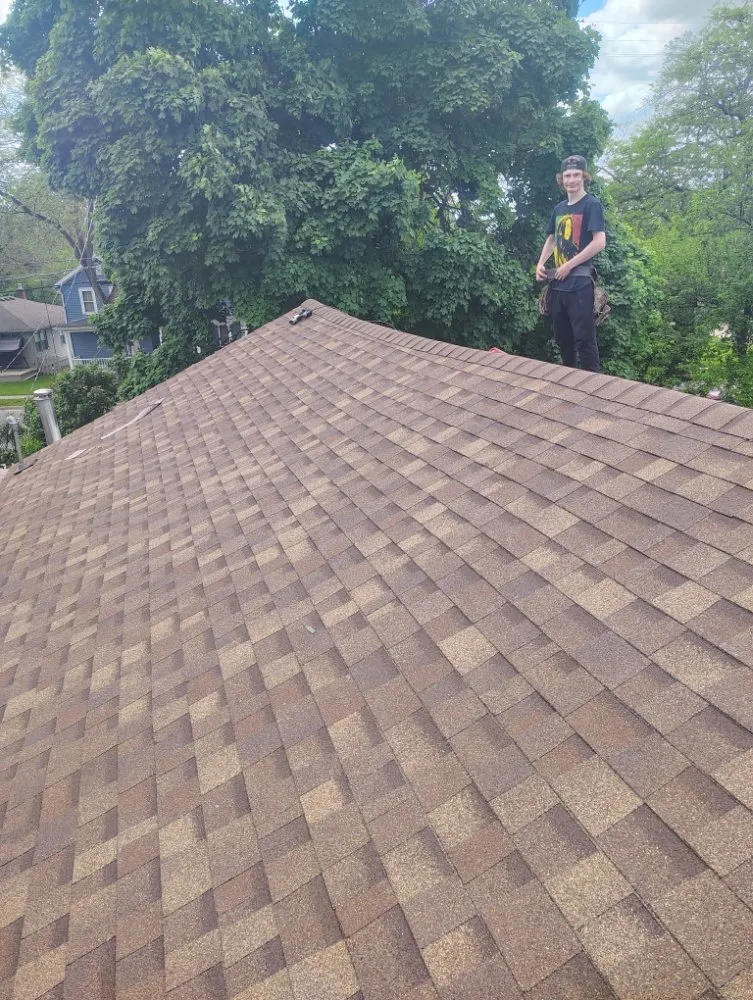 Slide of young roofing