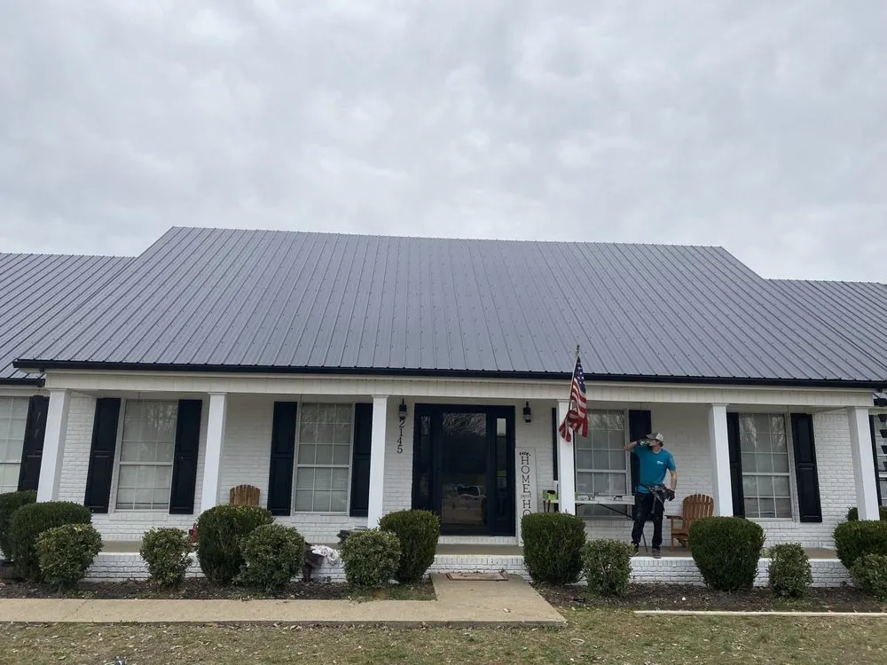 Slide of Young’s Tin Roofing Installation