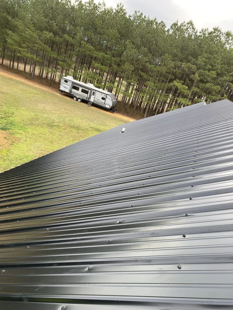 Slide of Young’s Tin Roofing Installation