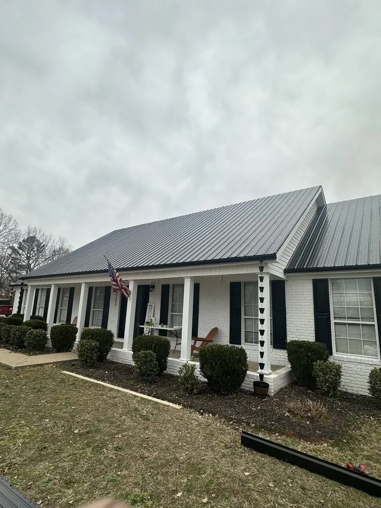 Slide of Young’s Tin Roofing Installation