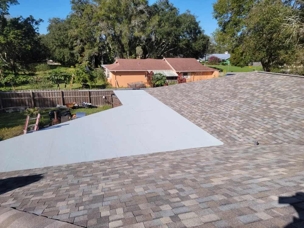 Slide of Yowell's Roofing