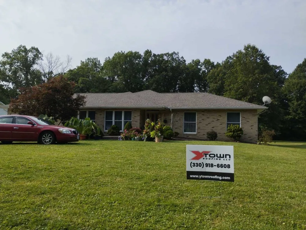 Slide of YTown Roofing
