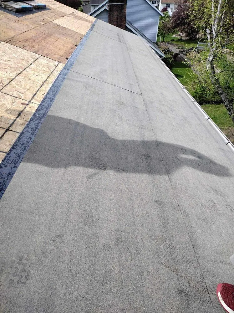 Slide of YTown Roofing