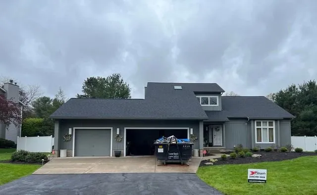 Slide of YTown Roofing