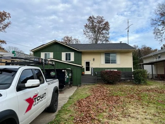 Slide of YTown Roofing