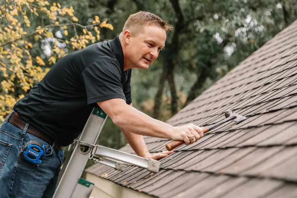 Slide of Yuras Roofing