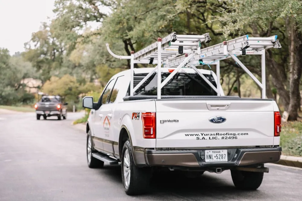Slide of Yuras Roofing