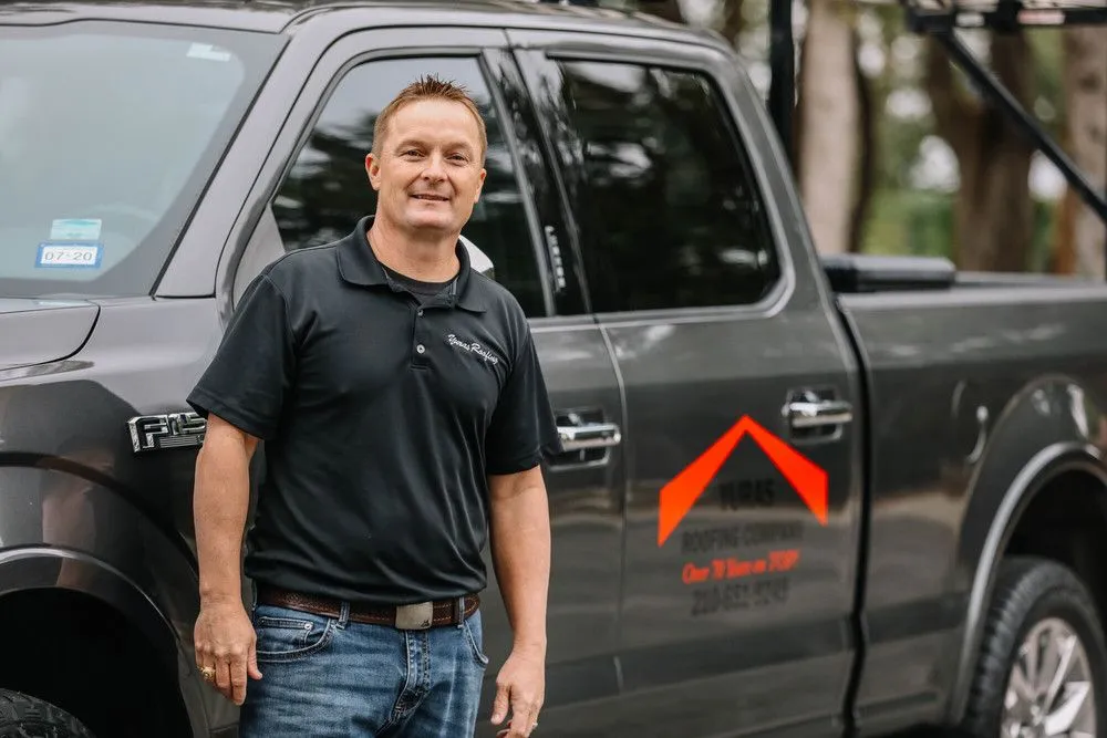 Slide of Yuras Roofing