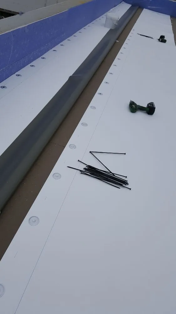 Licensed flat roof repair experts serving Grove City, MN - Yutzy Construction