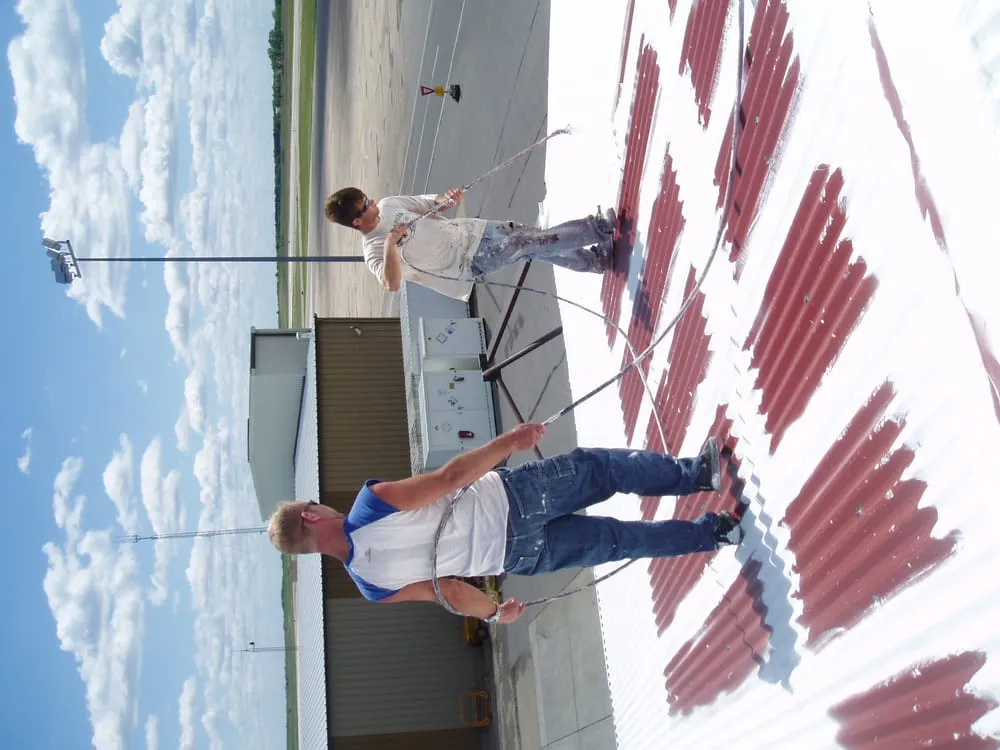 Slide of Yutzy's Roofing Service