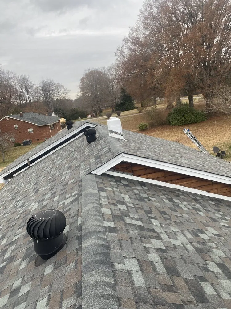 Slide of Y&V Roofing Construction