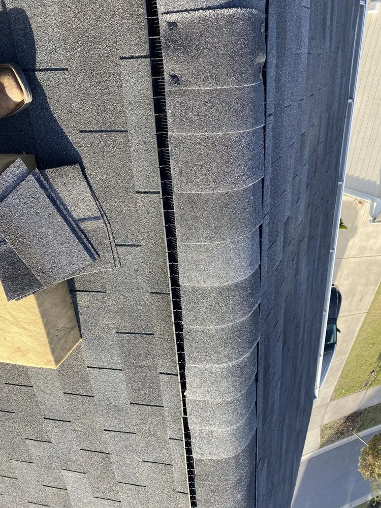 Slide of Y&V Roofing Construction