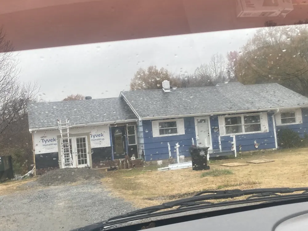 Slide of Y&V Roofing Construction