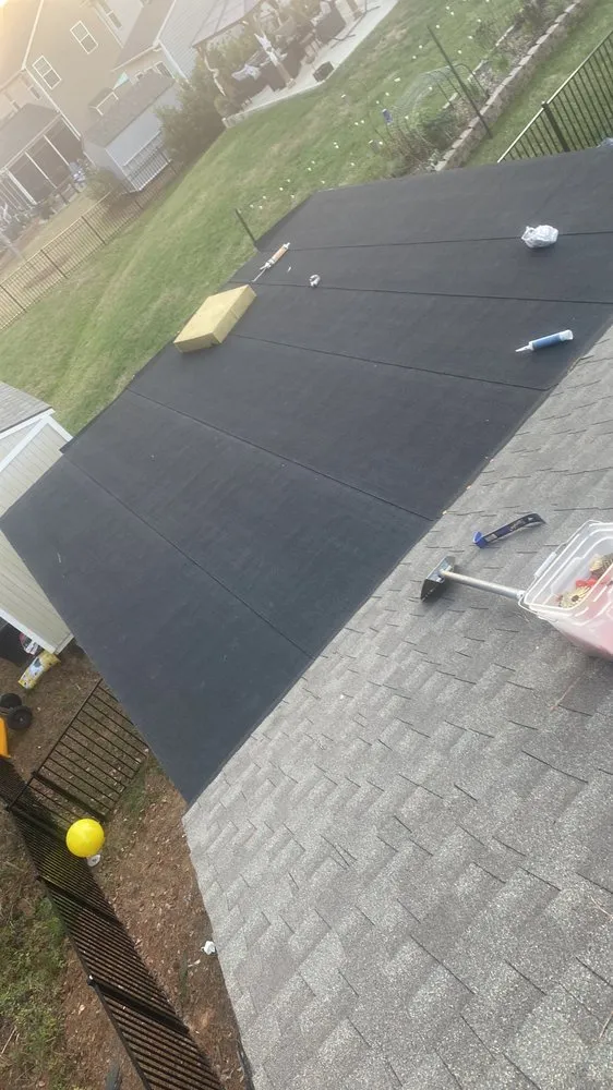 Slide of Y&V Roofing Construction