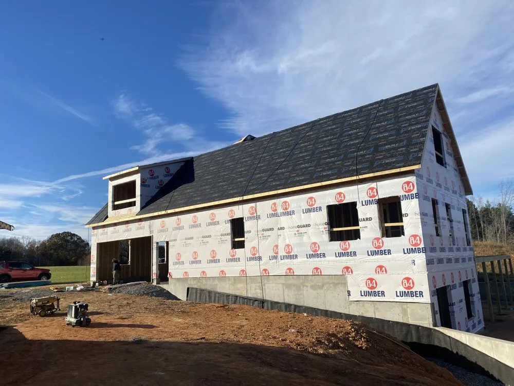 Slide of Y&V Roofing Construction