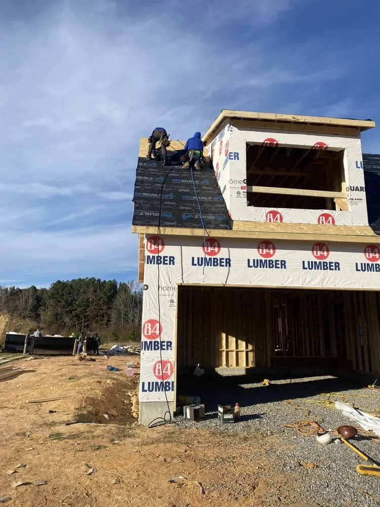 Slide of Y&V Roofing Construction