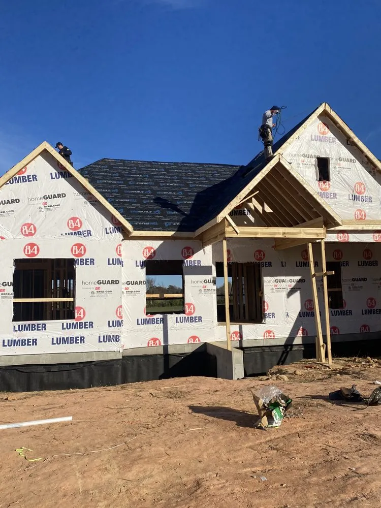 Slide of Y&V Roofing Construction