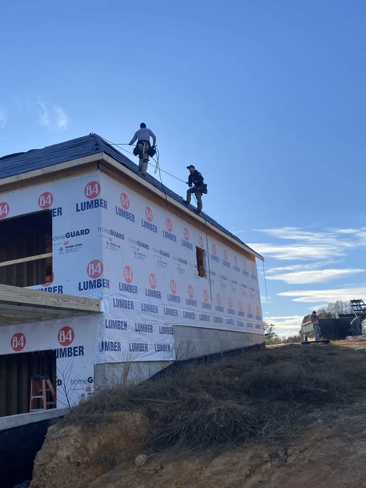 Slide of Y&V Roofing Construction