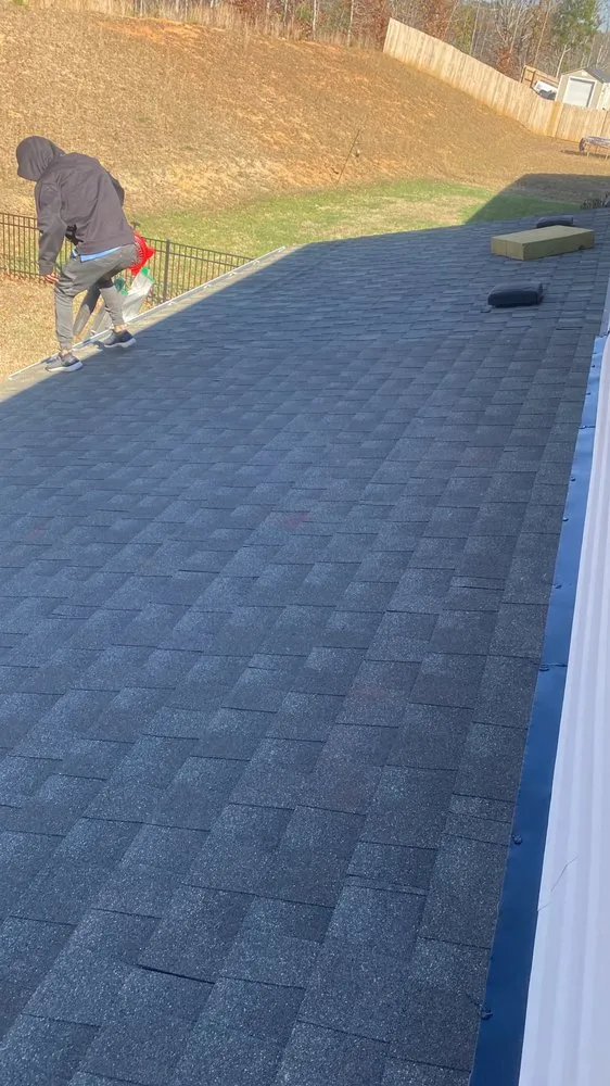 Slide of Y&V Roofing Construction