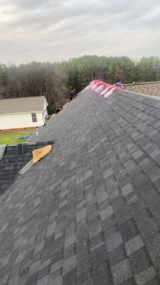 Slide of Y&V Roofing Construction