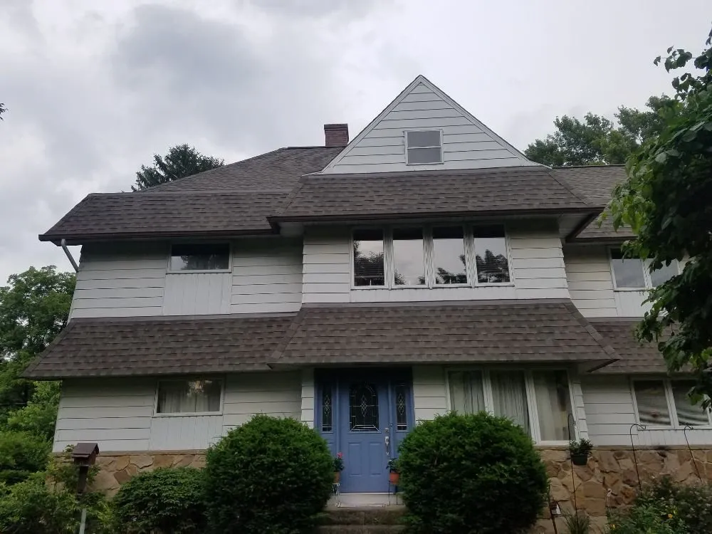 Licensed storm damage roof repair experts serving Dundee, OH - Y&W Roofing