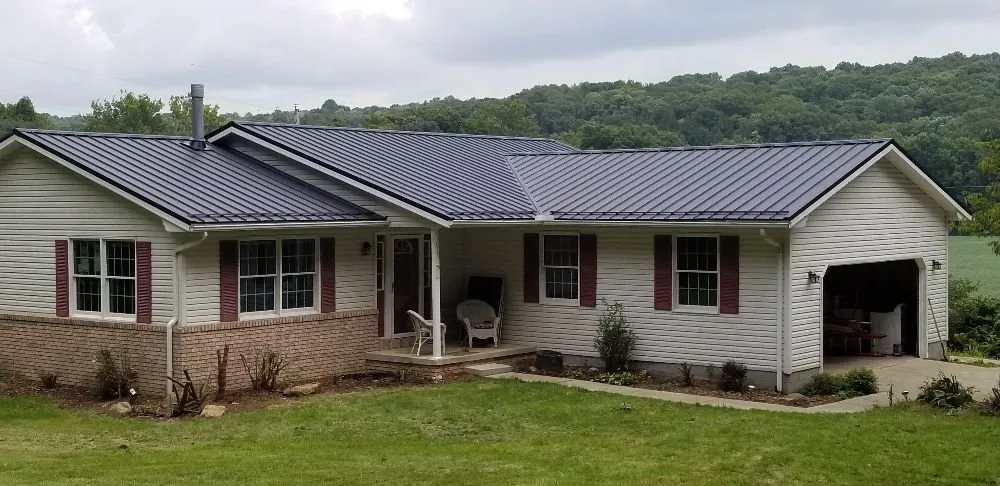 Professional flat roof repair for residential properties in Dundee, OH by Y&W Roofing