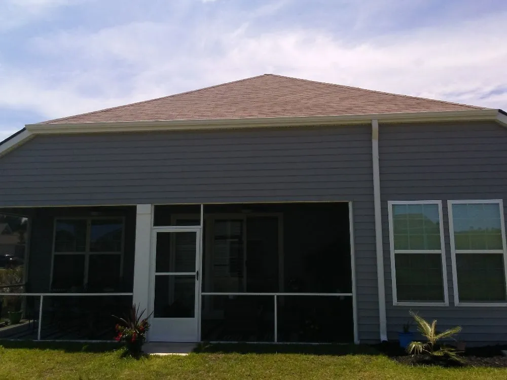 Slide of Zack's Seamless Gutters And More