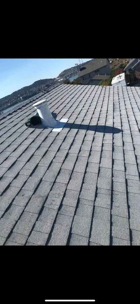 Slide of Zaguilan Roofing Service