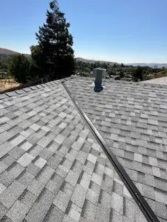 Slide of Zaguilan Roofing Service