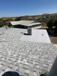 Slide of Zaguilan Roofing Service