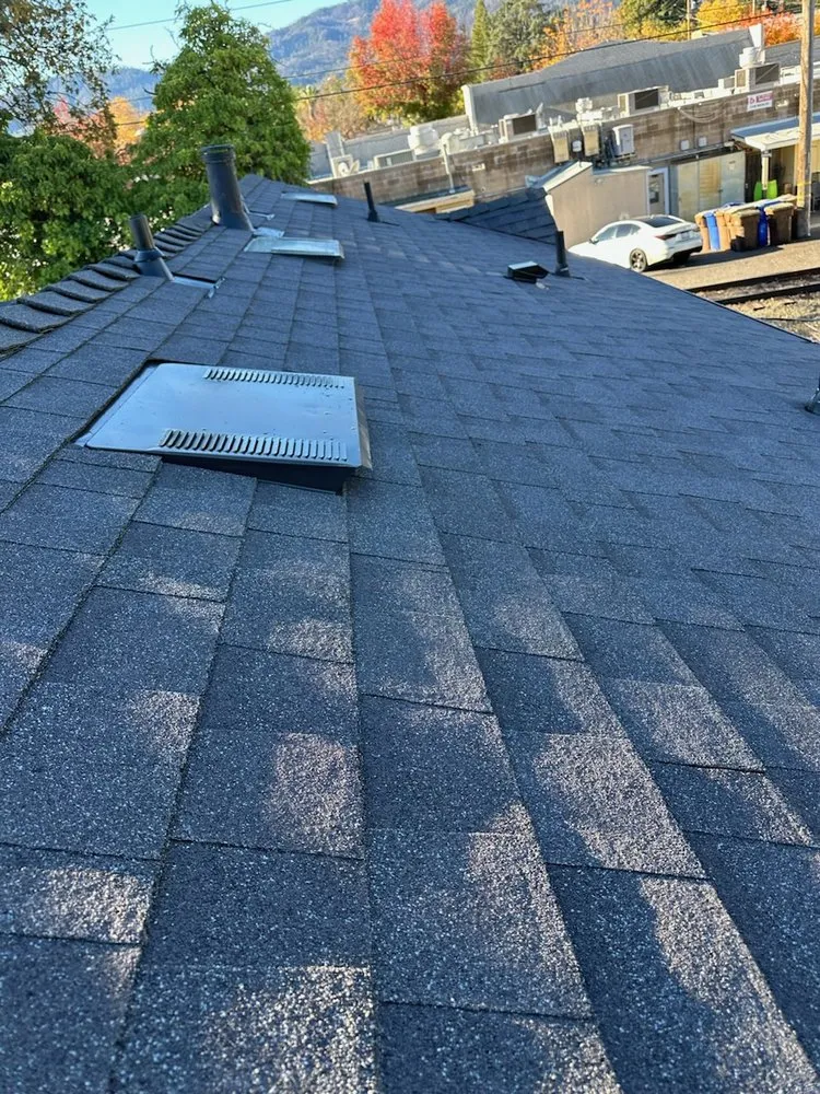 Slide of Zaguilan Roofing Service