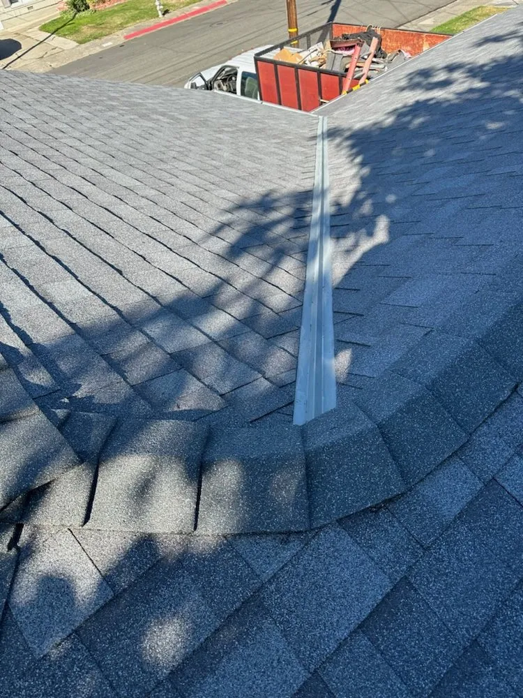 Slide of Zaguilan Roofing Service