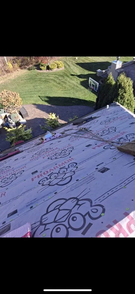 Slide of Zana Roofing & Construction