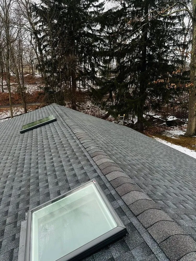 Slide of Zen Roofing Company