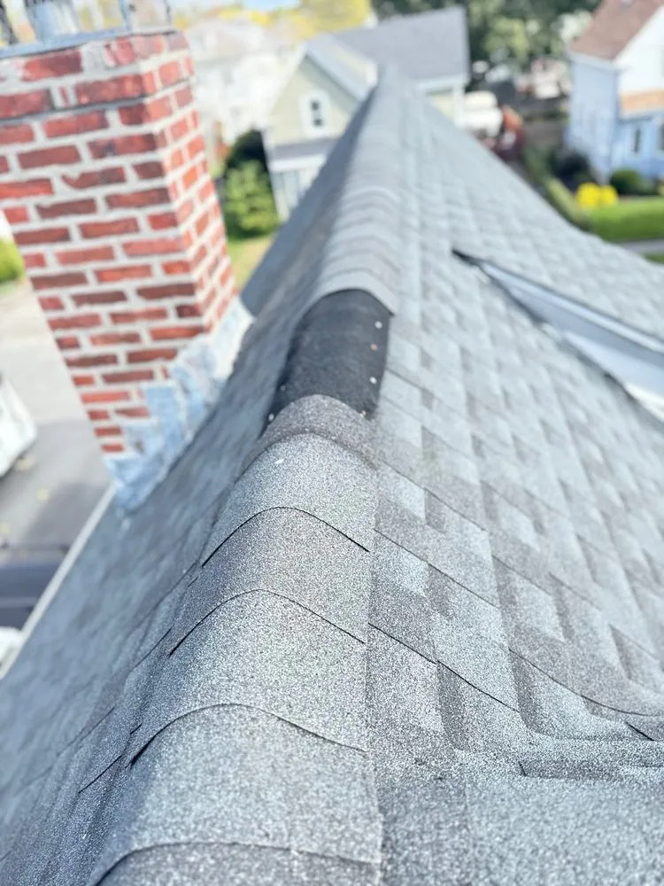 Slide of Zen Roofing Company