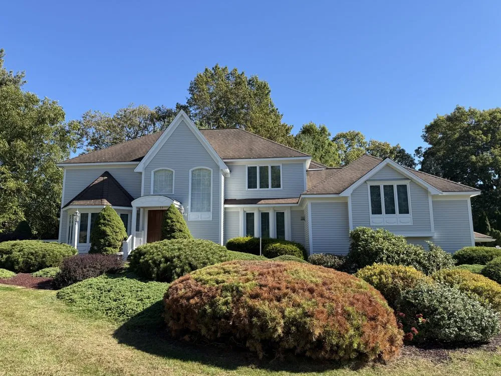 Slide of Zen Roofing Company