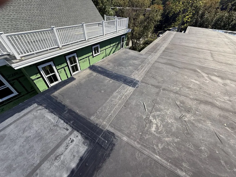 Slide of Zen Roofing Company