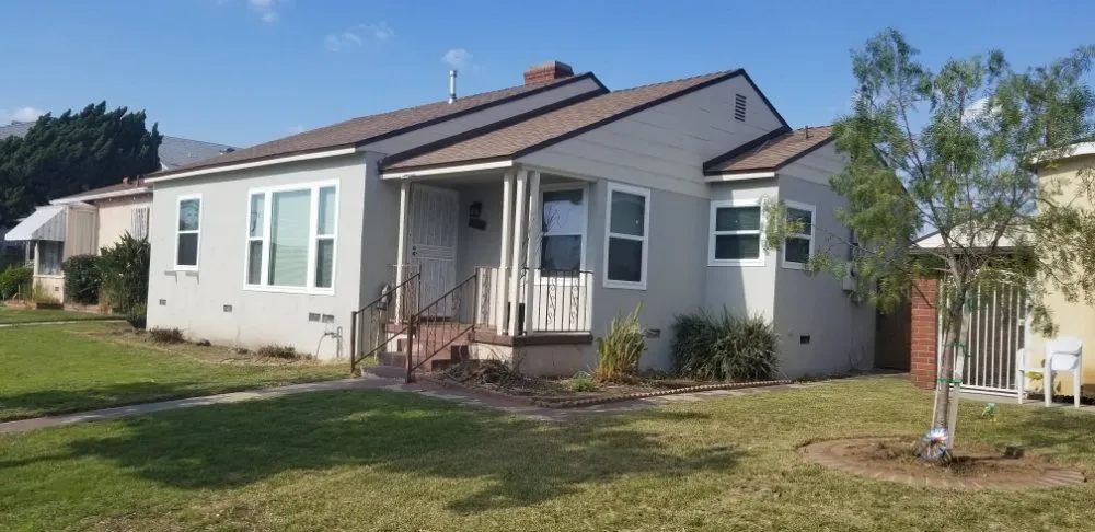 Slide of Zen Roofing Pros