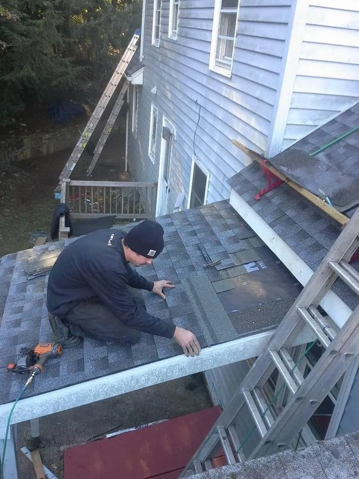 Professional flat roof repair for fast service in North Windham, CT by Zerik Construction