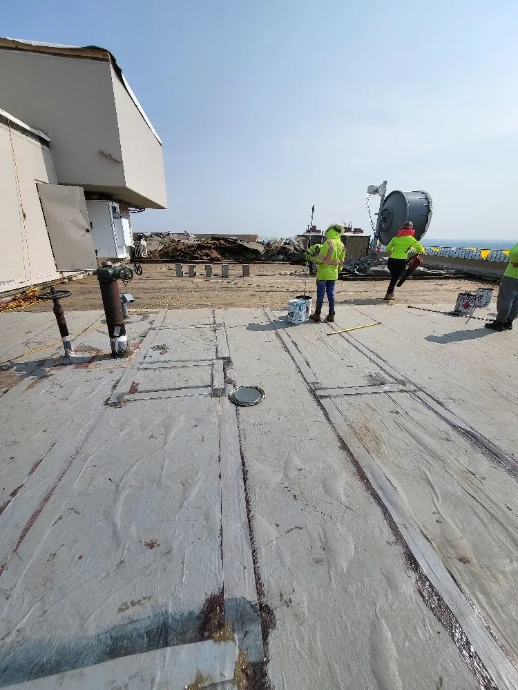 Slide of Zeus Roofing