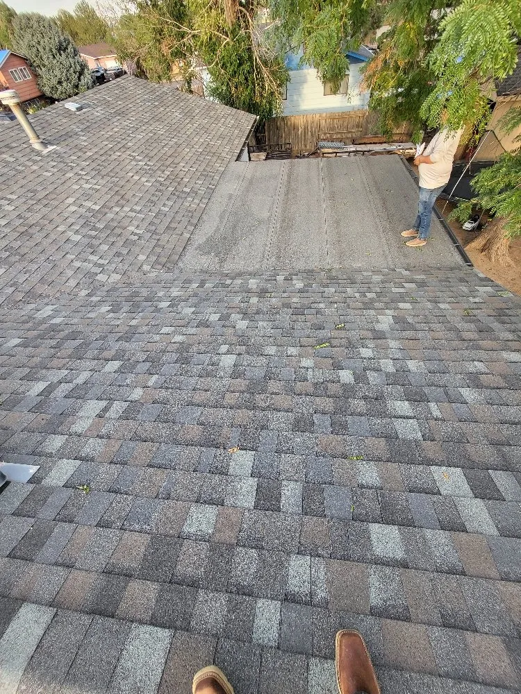 Slide of Zeus Roofing