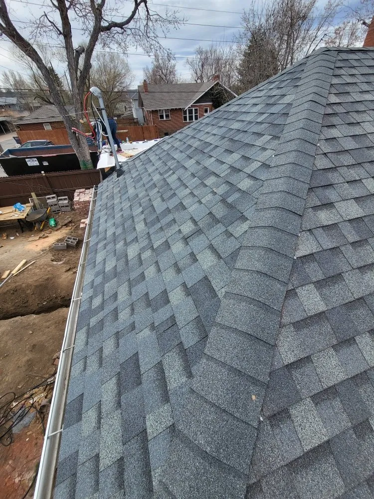 Slide of Zeus Roofing