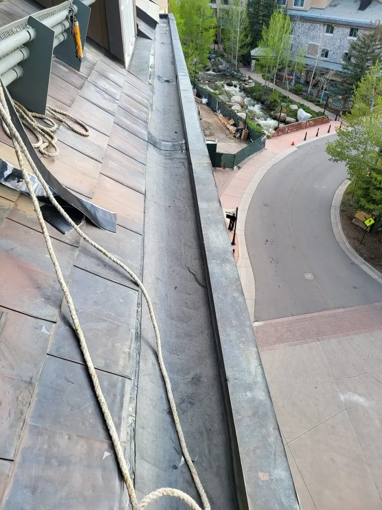 Slide of Zeus Roofing