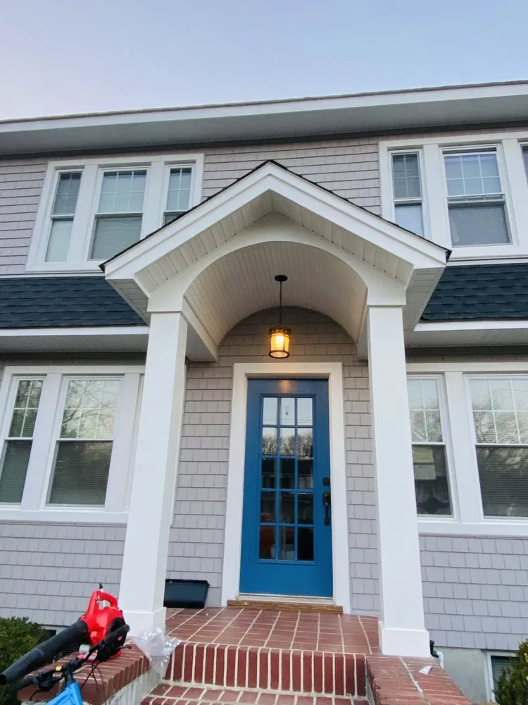 Slide of Zeus Siding & Windows