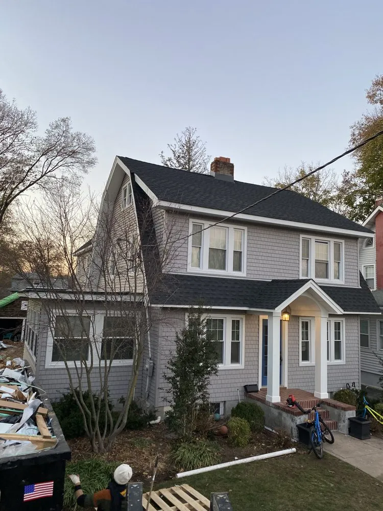 Slide of Zeus Siding & Windows