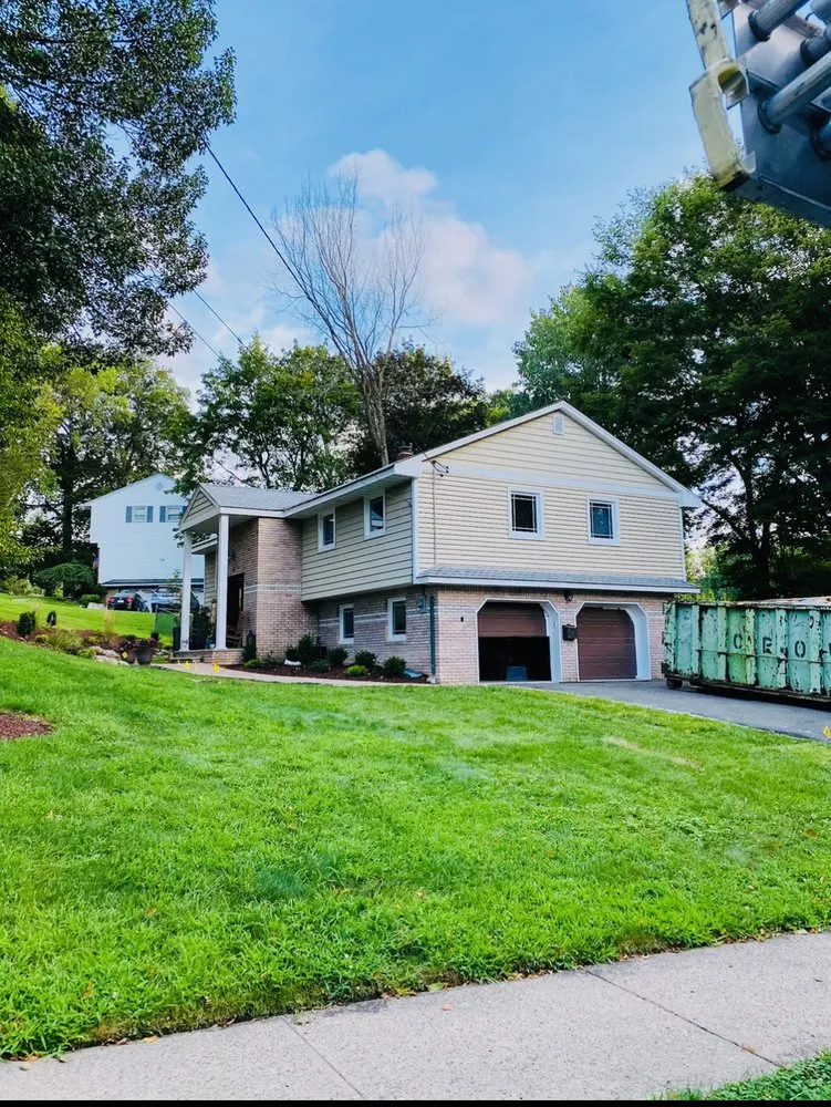 Slide of Zeus Siding & Windows