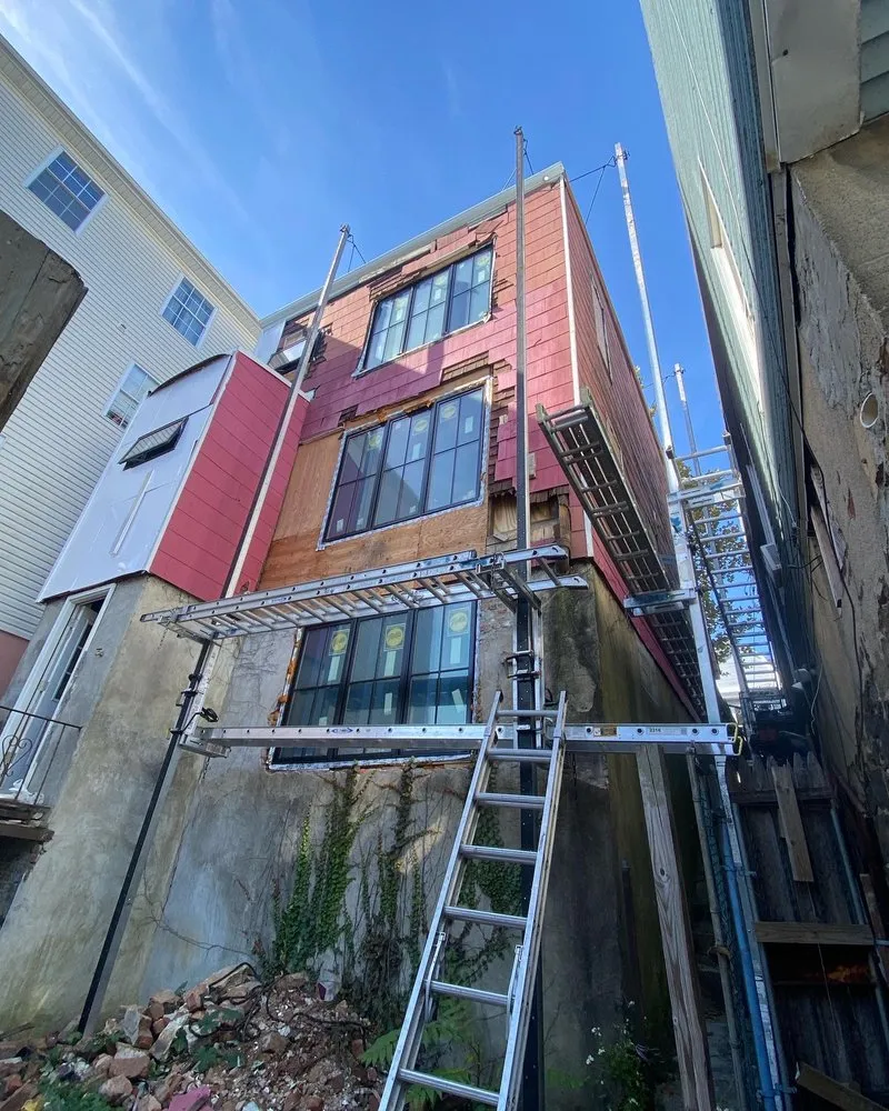 Slide of Zeus Siding & Windows