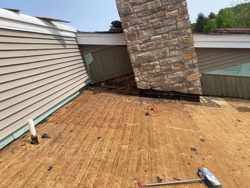 Slide of Zeus Siding & Windows