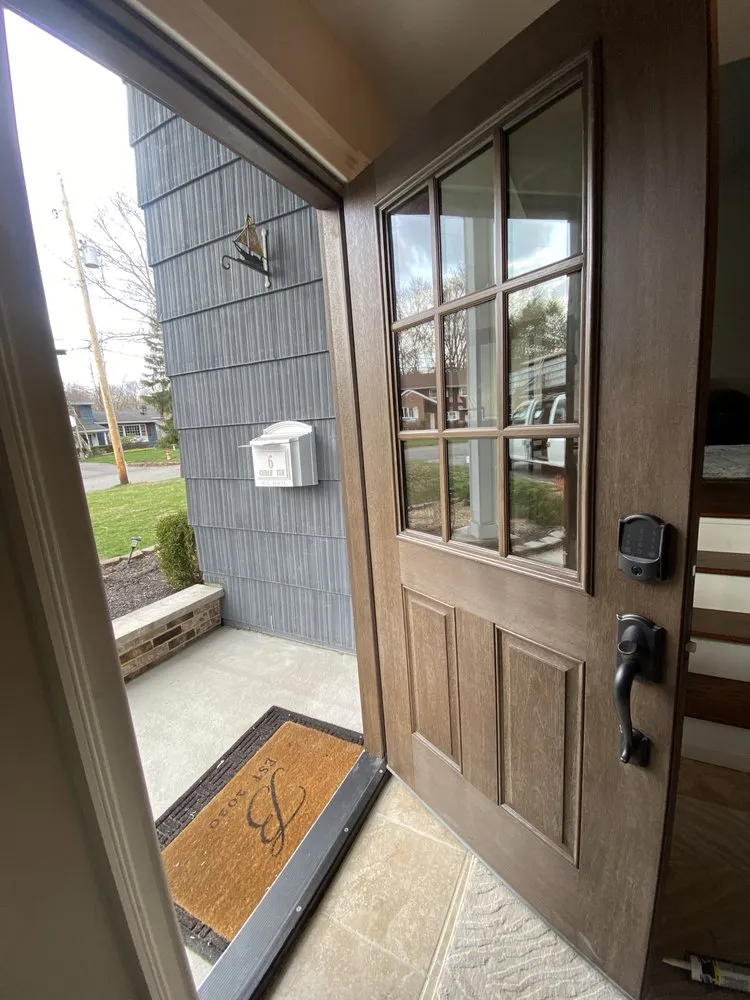 Slide of Zeus Siding & Windows