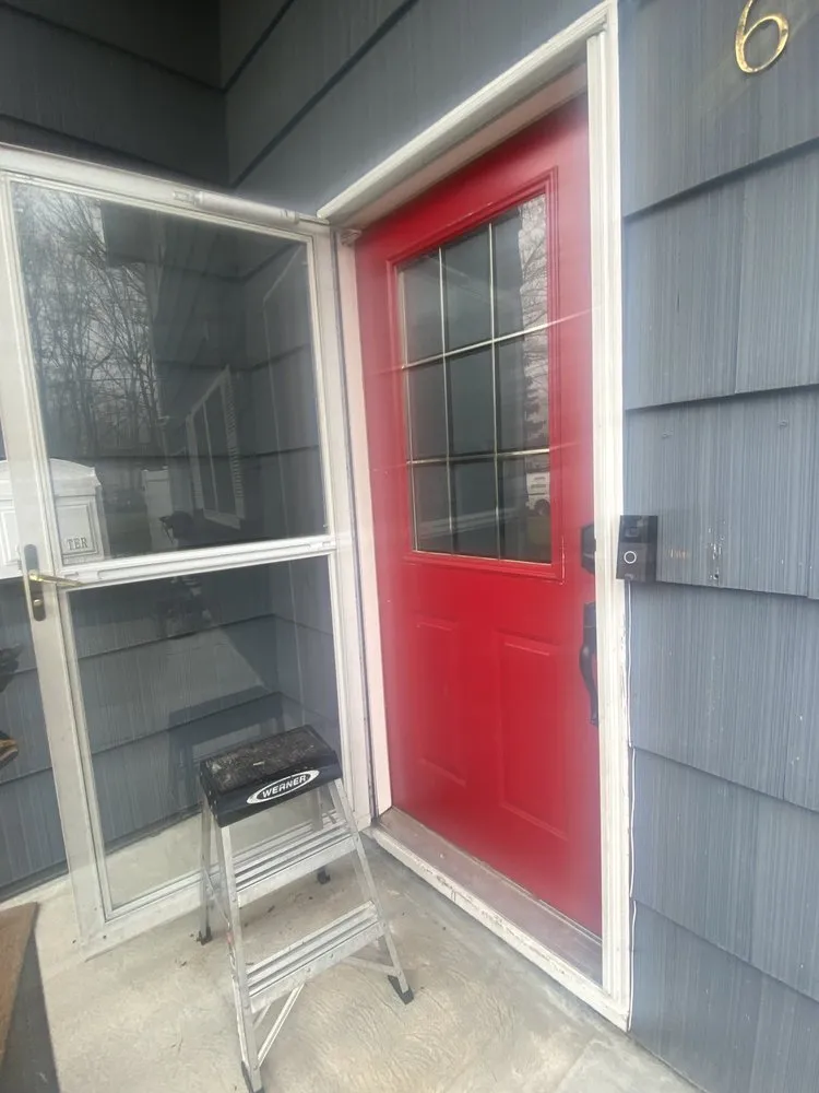 Slide of Zeus Siding & Windows